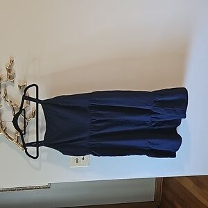 Linen blend navy dress with adjustable straps and smocked back
